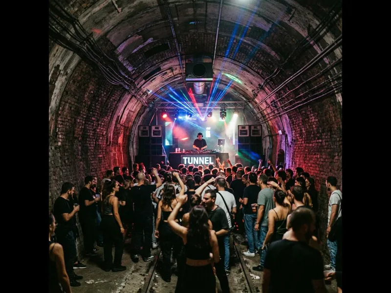 Tunnel club Milan underground techno venue with atmospheric lighting