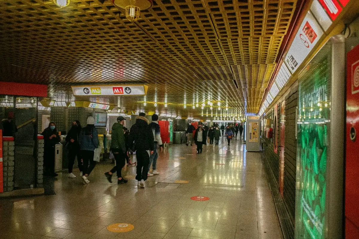 Passengers in a Milan metro station