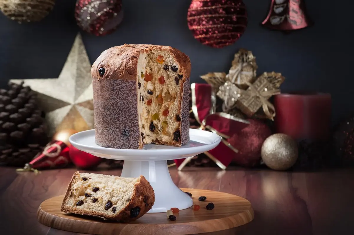 Sliced panettone with Christmas decorations