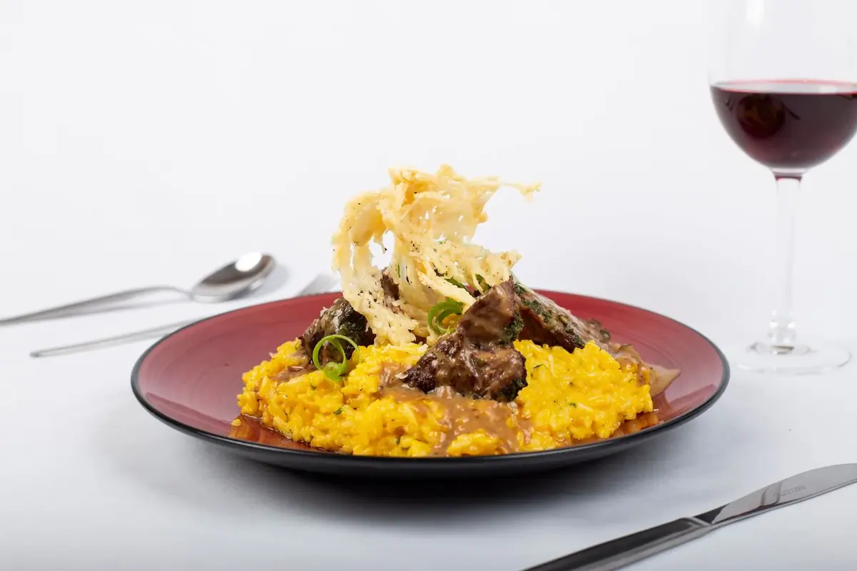 Golden saffron risotto with a parmesan crisp