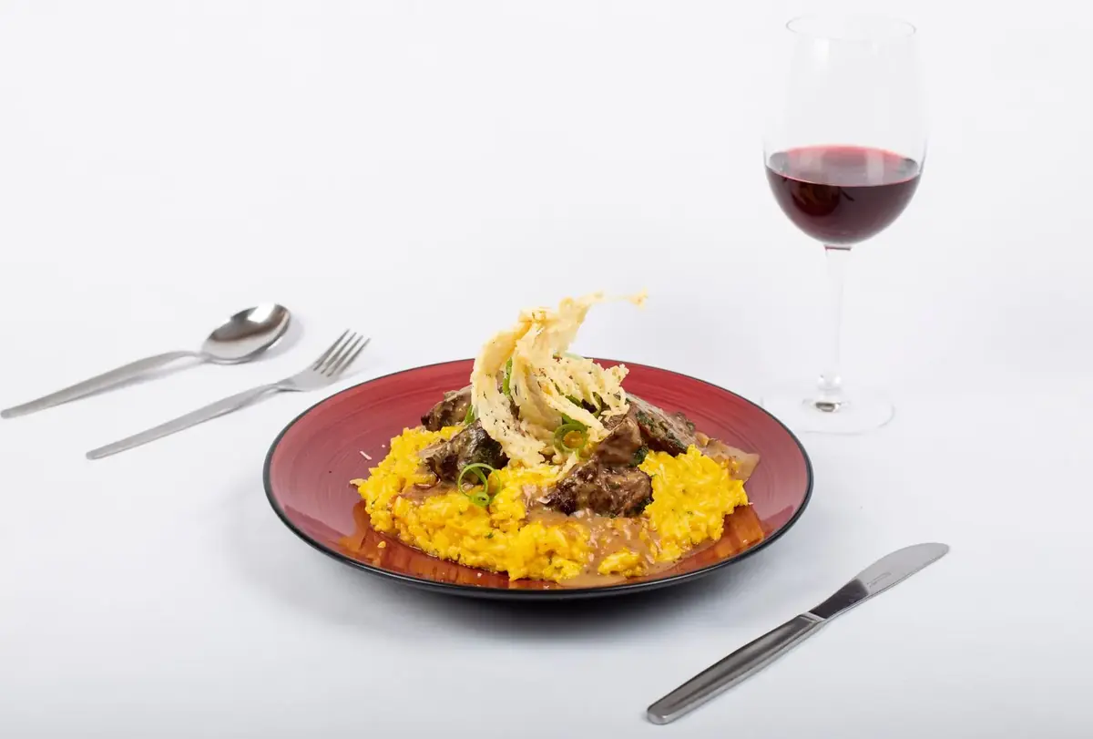 Saffron risotto with braised meat and red wine